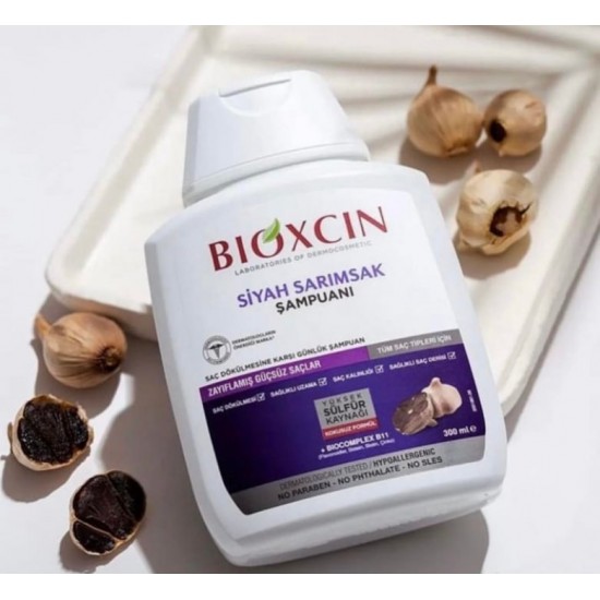 Bioxcin шампоан против косопад с черен чесън 300мл